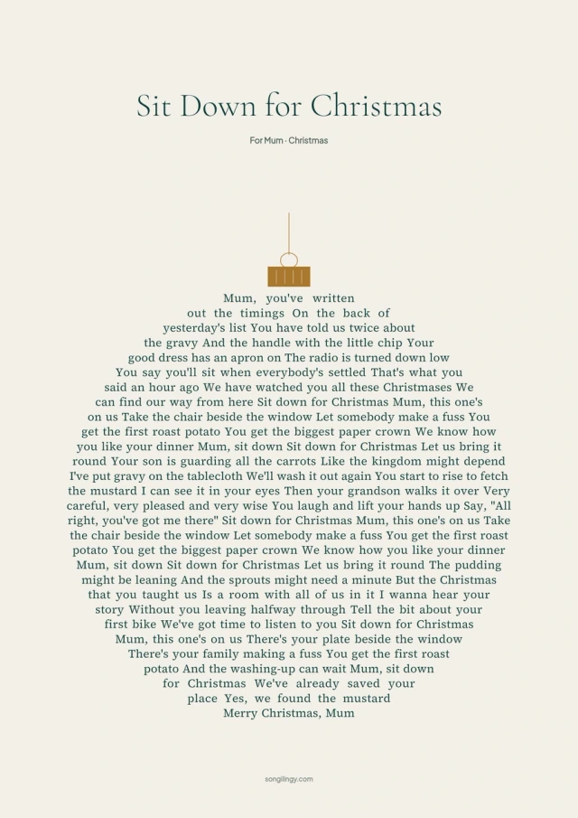 Christmas song lyrics arranged into a round hanging bauble with a gold cap