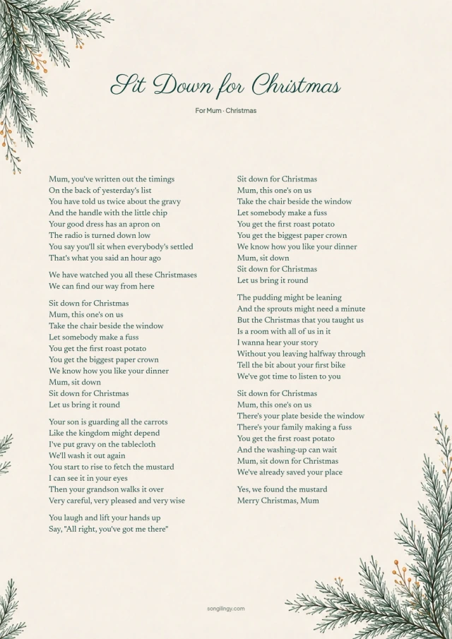 Christmas song lyrics on cream paper with delicate evergreen branches